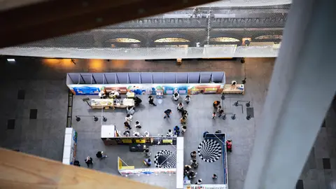 Top view of a bustling indoor exhibition space in Taipei, Taiwan.