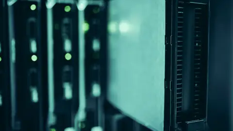 Close-up of server racks in a data center highlighting modern technology infrastructure.